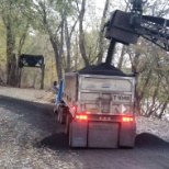 Hauling coaling coke from river to plant