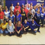 The Lenexa, Kansas office showing their team colors!