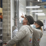 Employees at the Bordeaux factory checking out the products